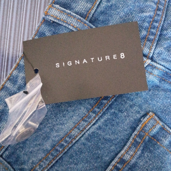 Signature Blue Denim Mini Skirt with Colorful Pattern - Picture 2 of 4